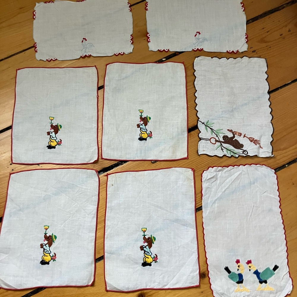 Set of 8 hand embroidered vintage linens